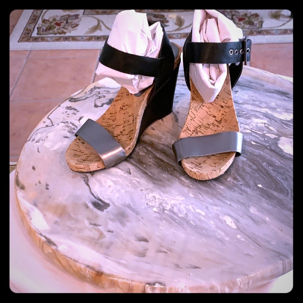 BCBG black and silver wedge sandal.